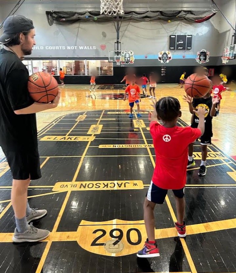 Nate coaching Breakthrough youth basketball