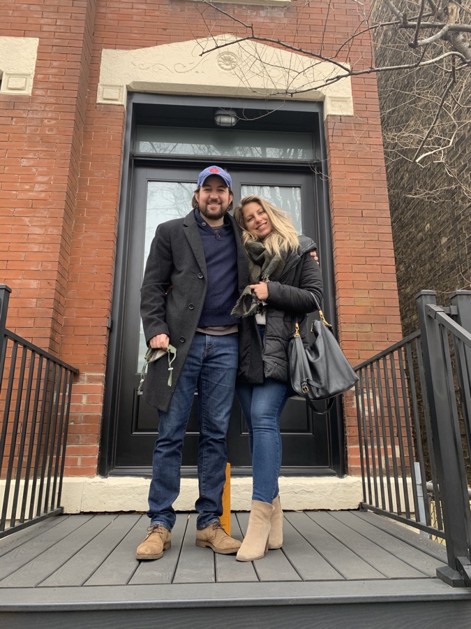 Nate and Janice outside their home on West Warren